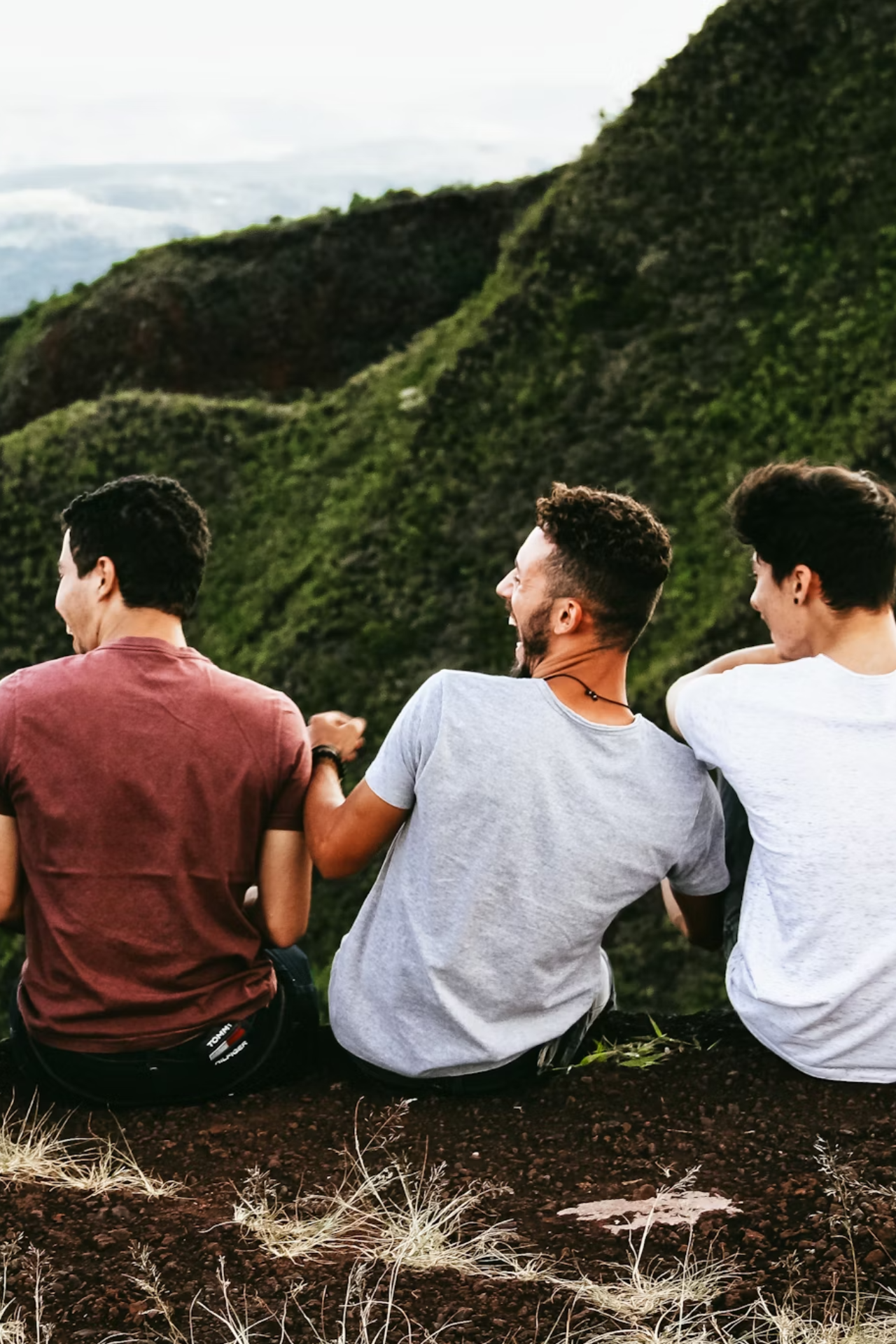 Men doing makeup indoors